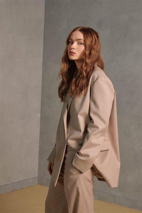 sadie sink in a suit.